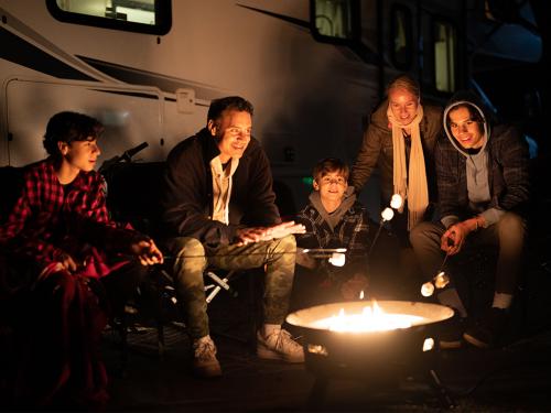 Four Seasons RV Rentals - Class C Large | Scenic Image Family Campfire